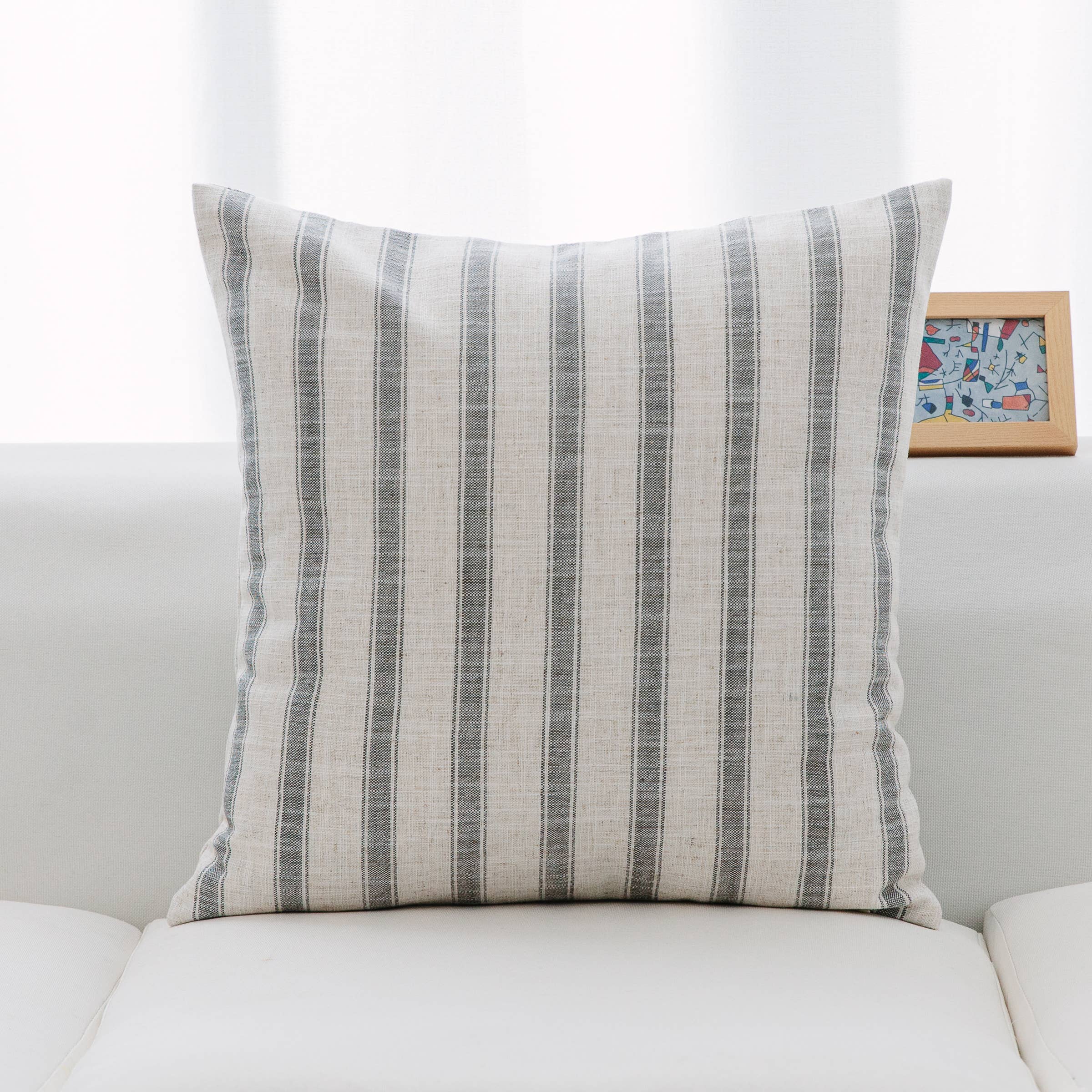 Neutral tones pillows in classic check and stripe pattern