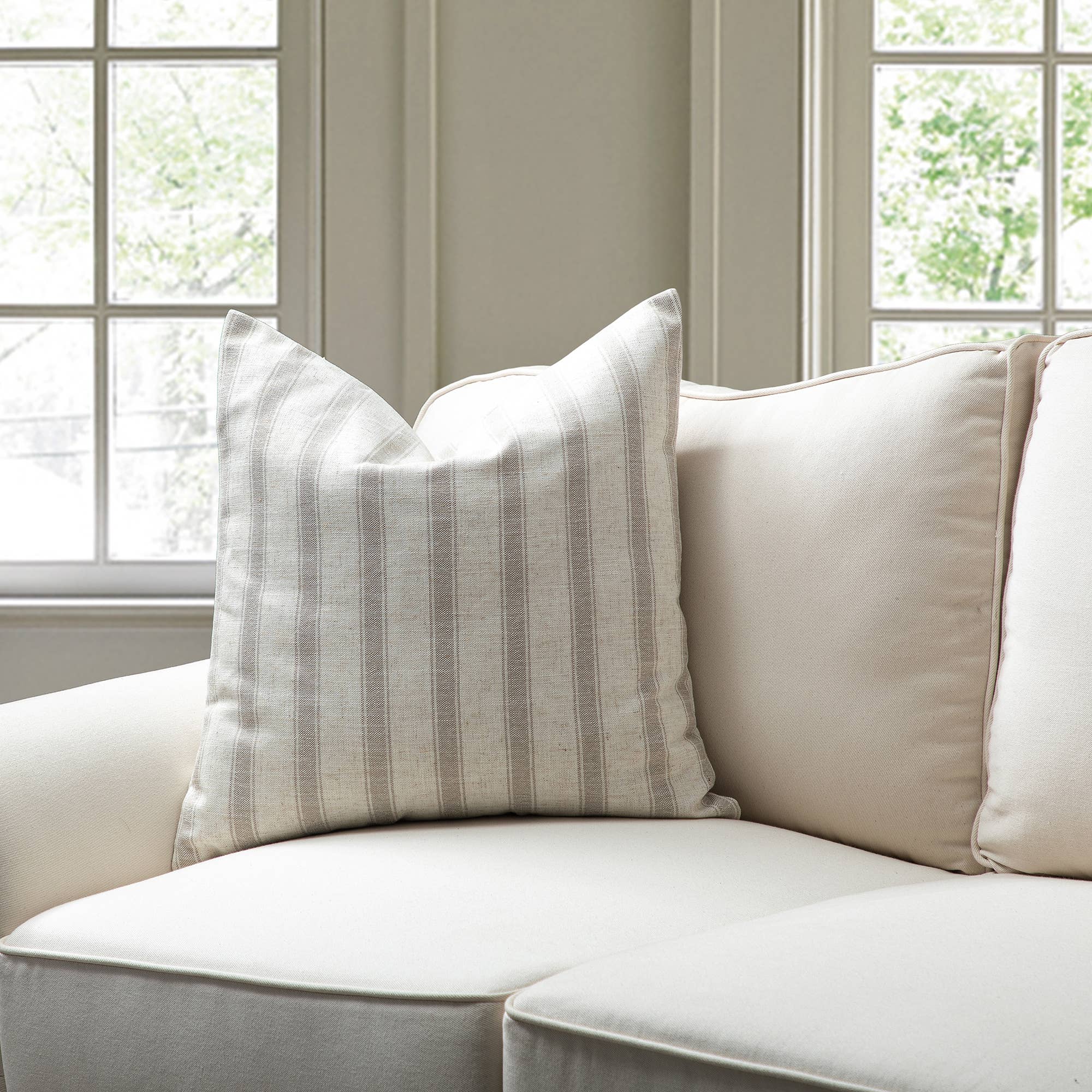 Neutral tones pillows in classic check and stripe pattern