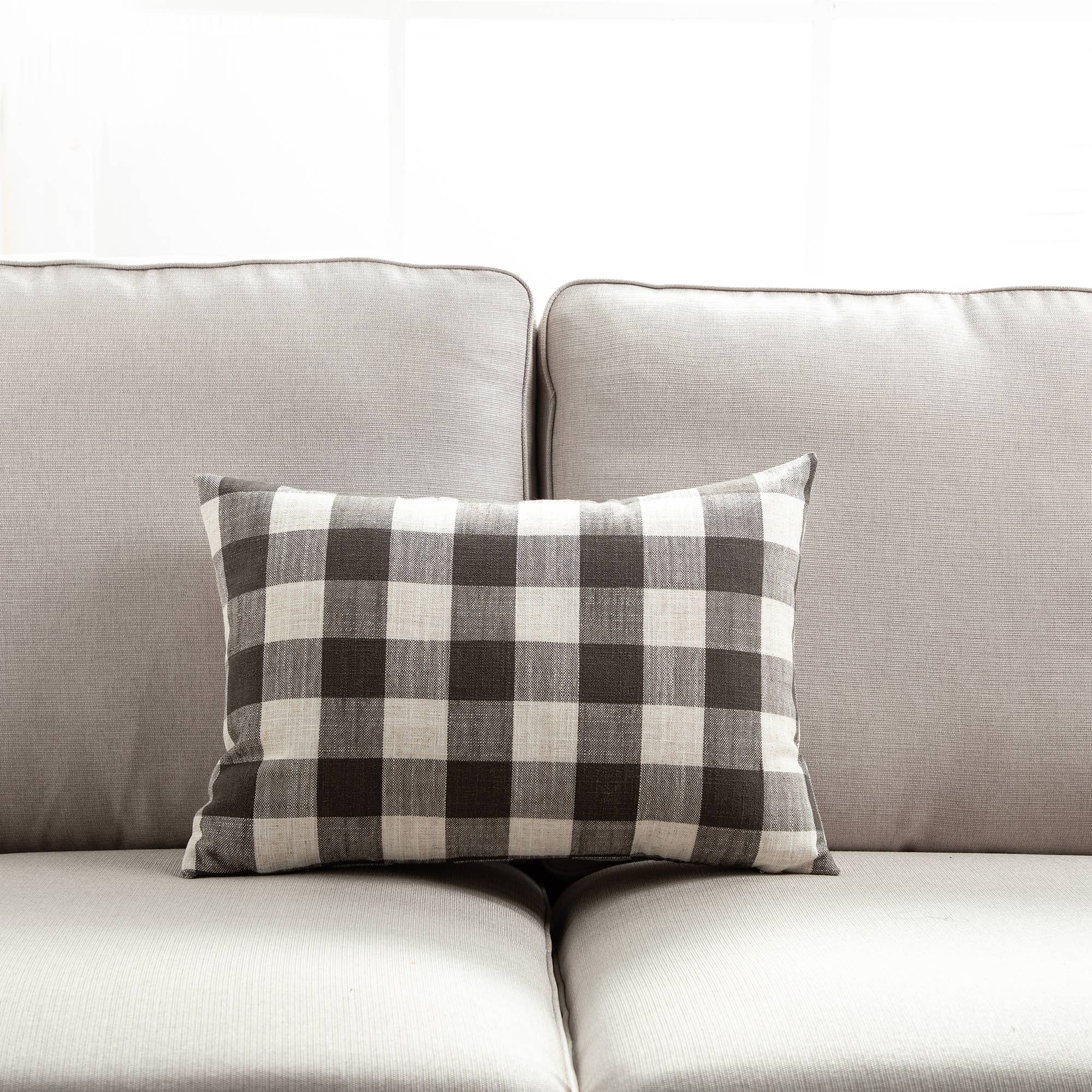 Neutral tones pillows in classic check and stripe pattern