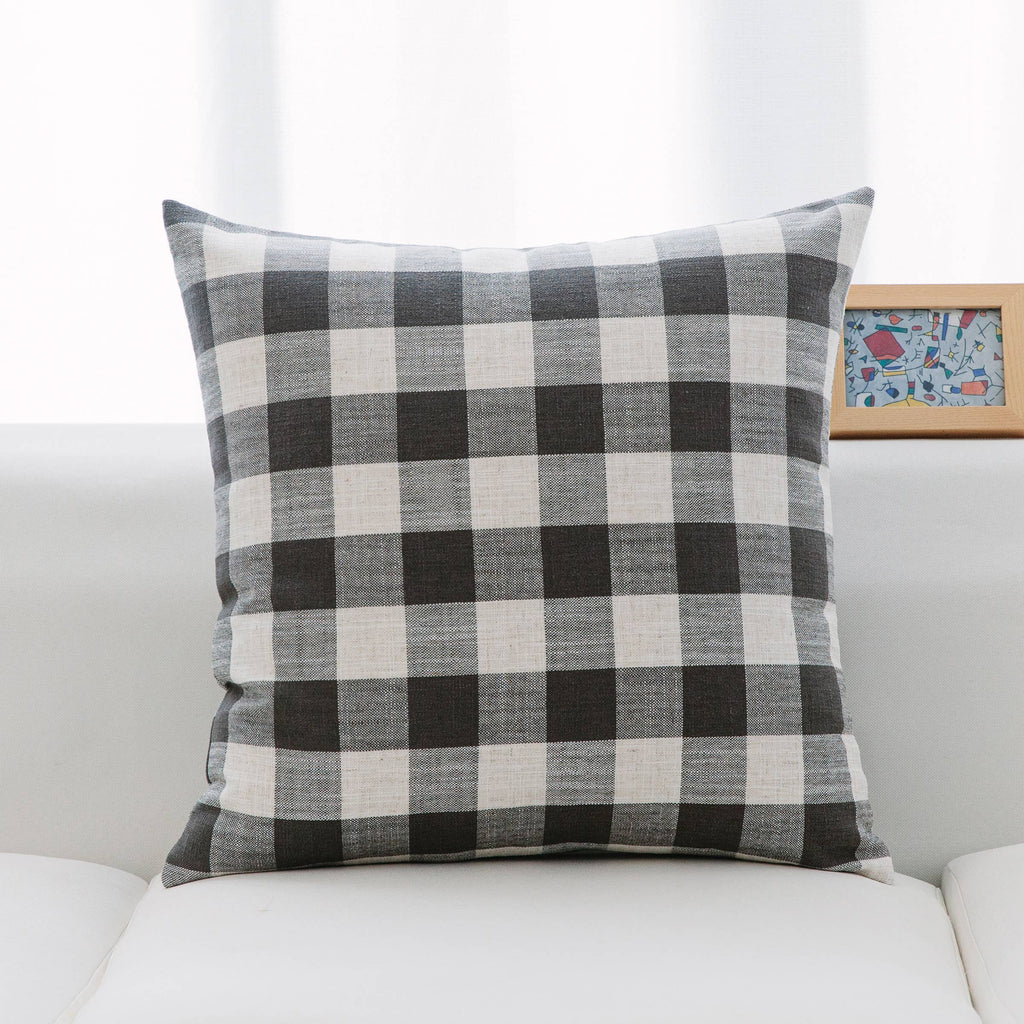 Neutral tones pillows in classic check and stripe pattern