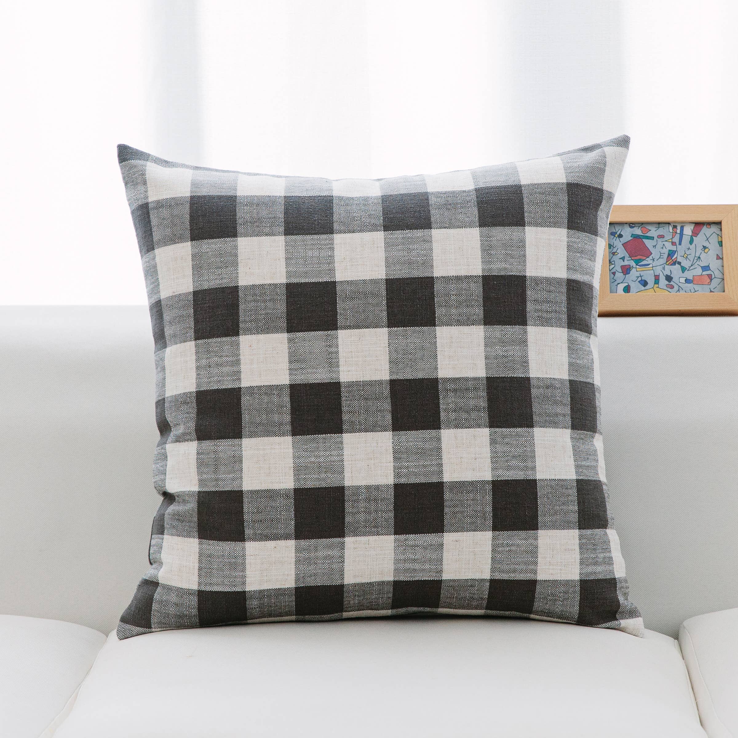 Neutral tones pillows in classic check and stripe pattern