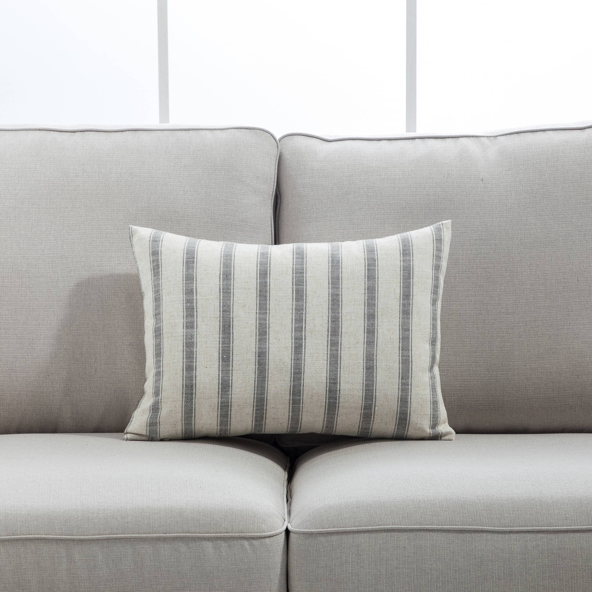 Neutral tones pillows in classic check and stripe pattern
