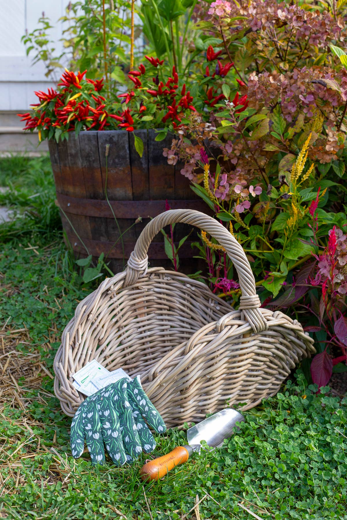 OVAL GREY RATTAN GATHERING BASKET